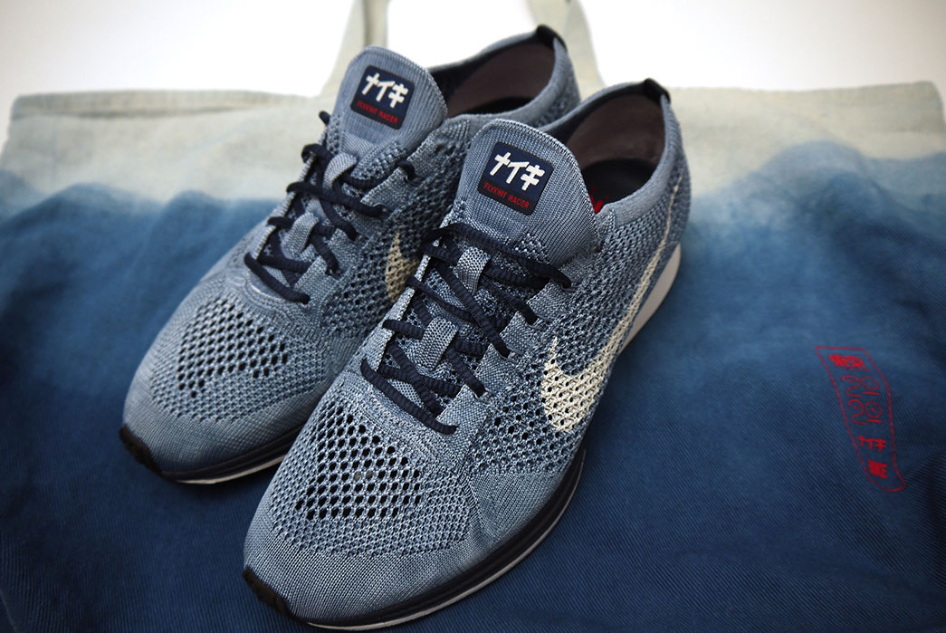 nike-hand-indigo-dyed-flyknit-racer-for-2020-tokyo-olympics-front-with-bag