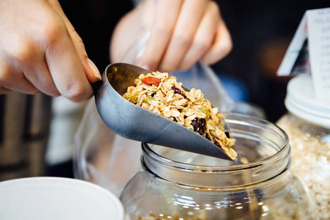 pouring_granola_into_jar.jpg.650x0_q70_crop-smart